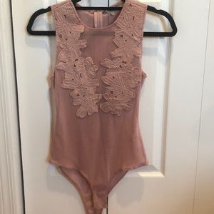 Charlotte Russe Blush pink-mesh bodysuit (size XS)